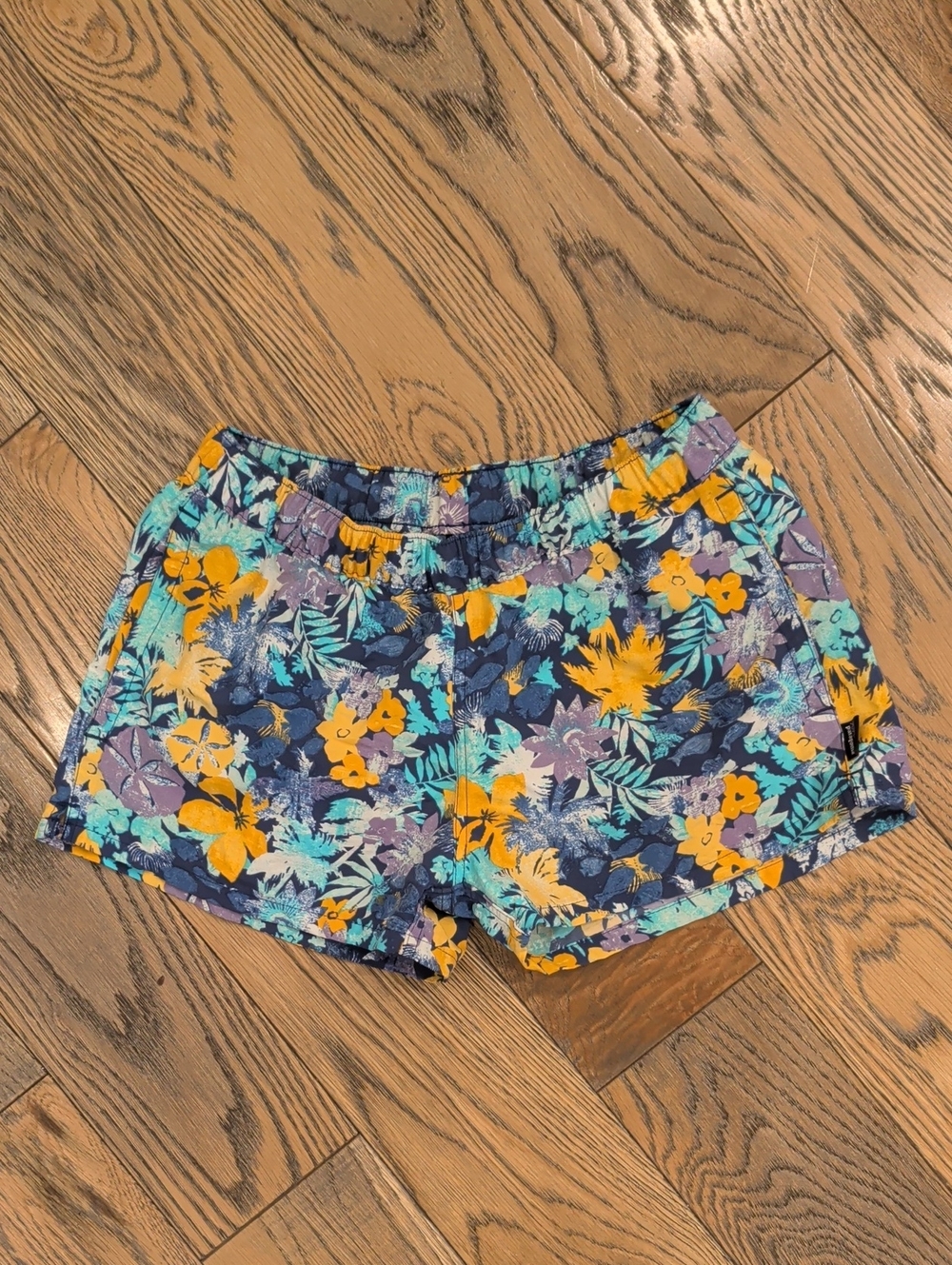 Patagonia Floral Athletic Shorts in Navy with Yellow & Teal Accents